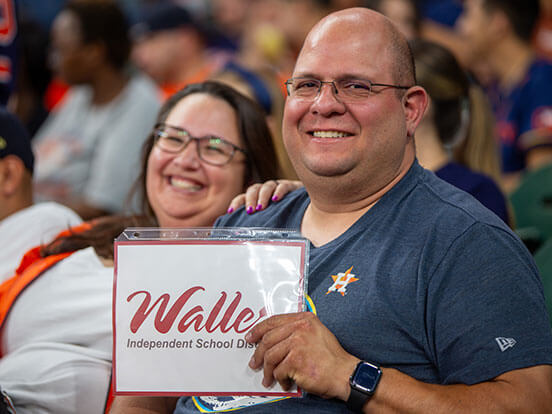  This is a photo of a teacher of the year from Waller ISD who won free Astros tickets courtesy EFHC